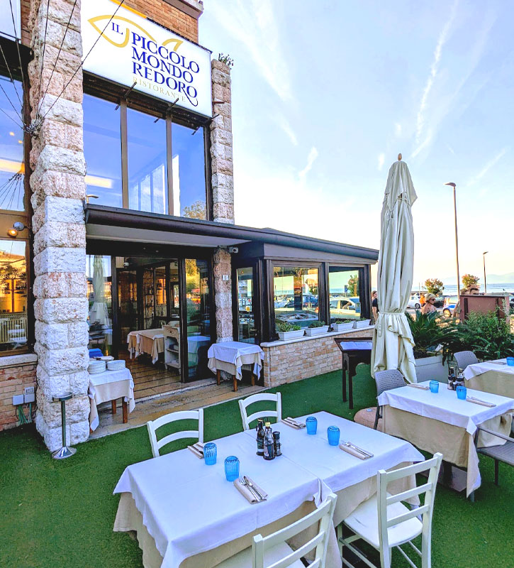 Ristorante storico Il Piccolo Mondo Redoro, specializzato in cucina di pesce a Peschiera del Garda.